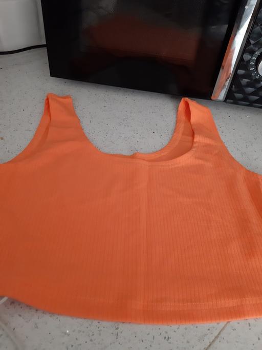  — new top ladies