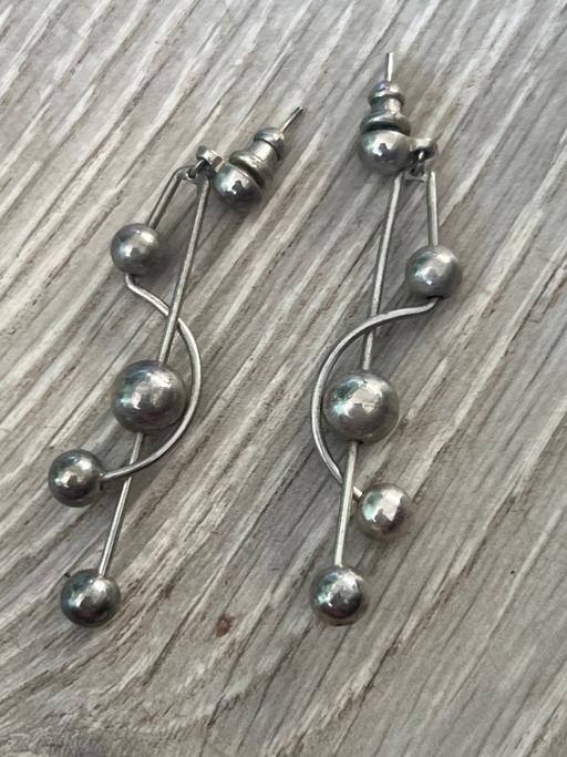  — Earrings