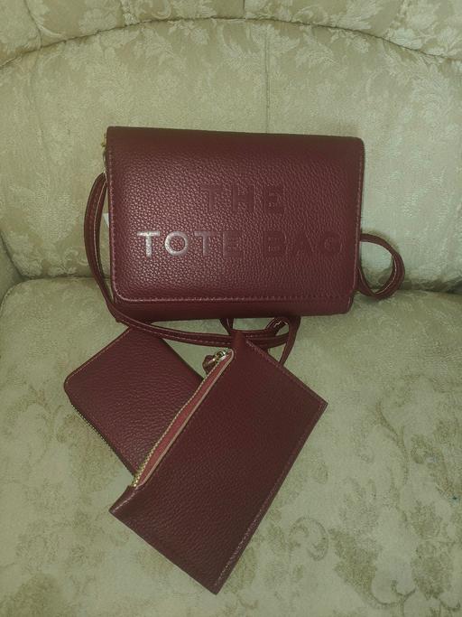  — Gorgeous Bag with attached purses