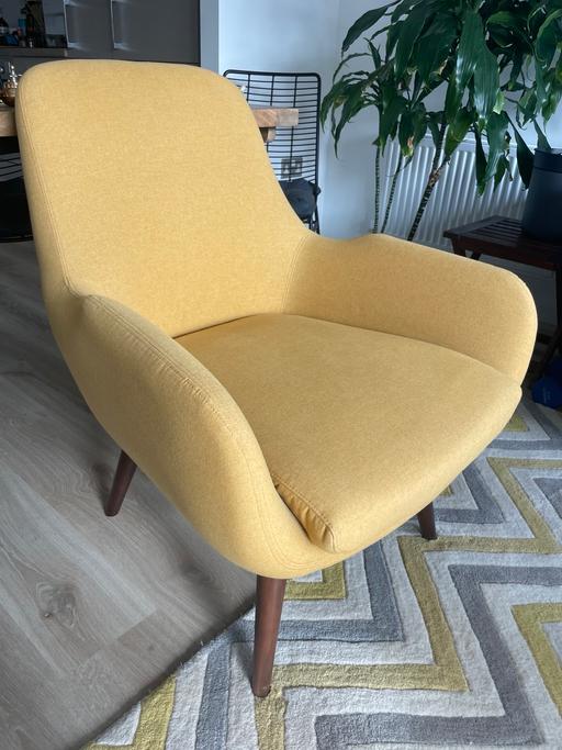  — Yellow mid century style armchair