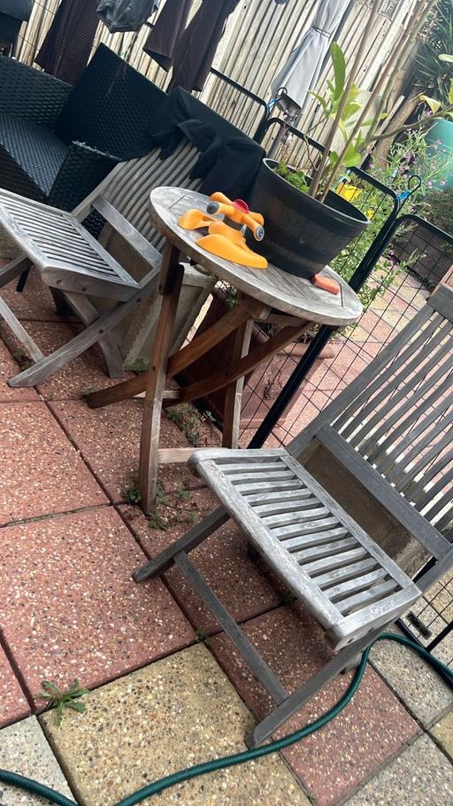 — Wooden table and two chairs