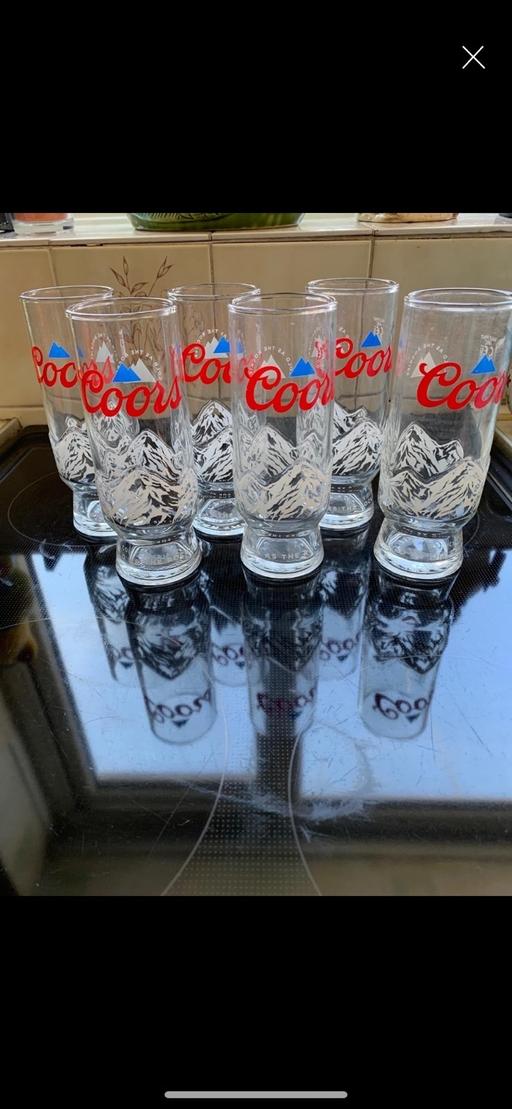  — Coors larger glass’s