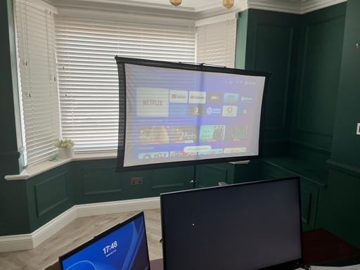  — Projector and screen