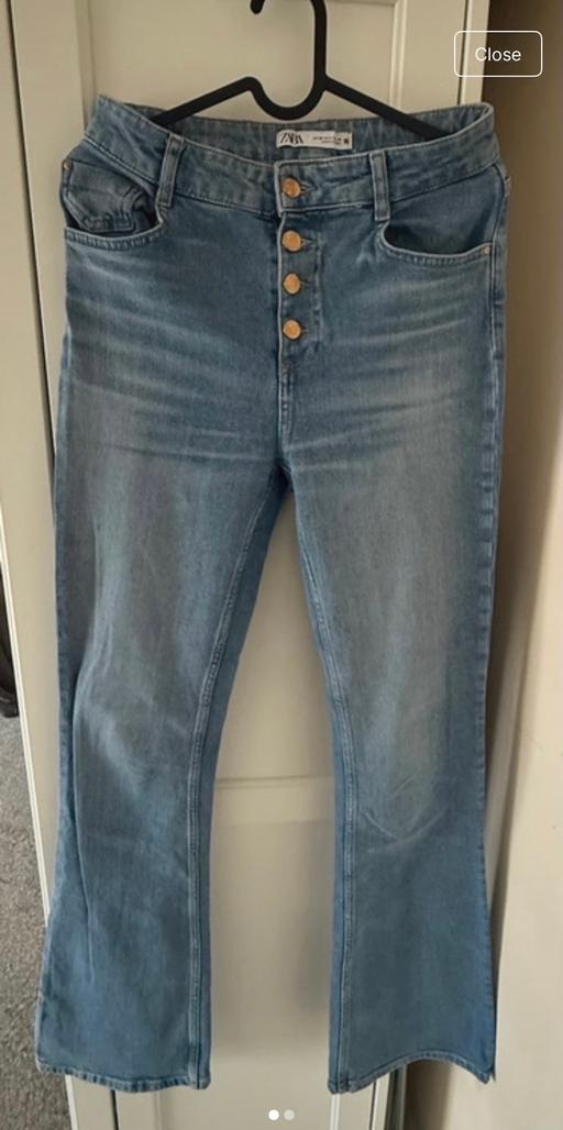  — Denim