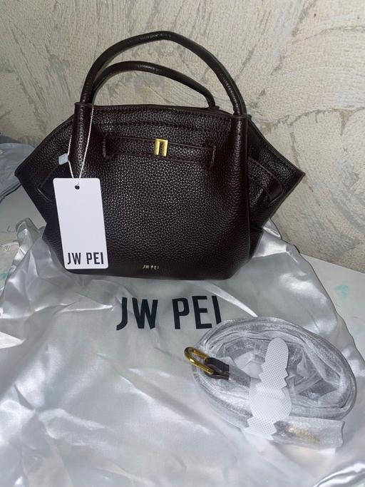  — Brown small bag