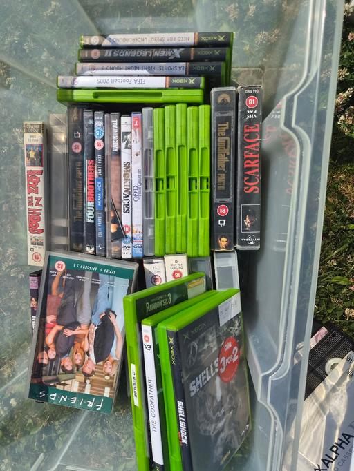  — Box of xbox games, video cassettes etc