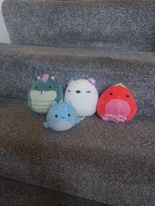  — 4 medium Squishmallows