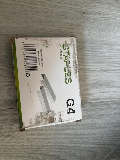  — Staples