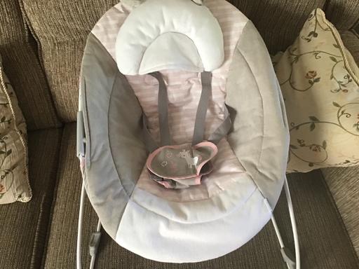  — Pink and grey baby bouncer