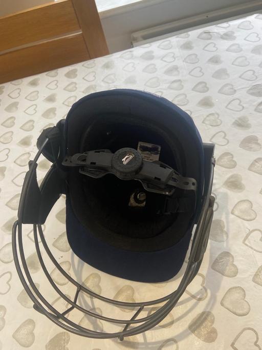  — Cricket helmet and gloves
