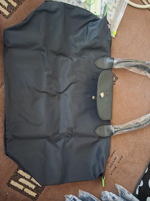  — black longchamp handbag