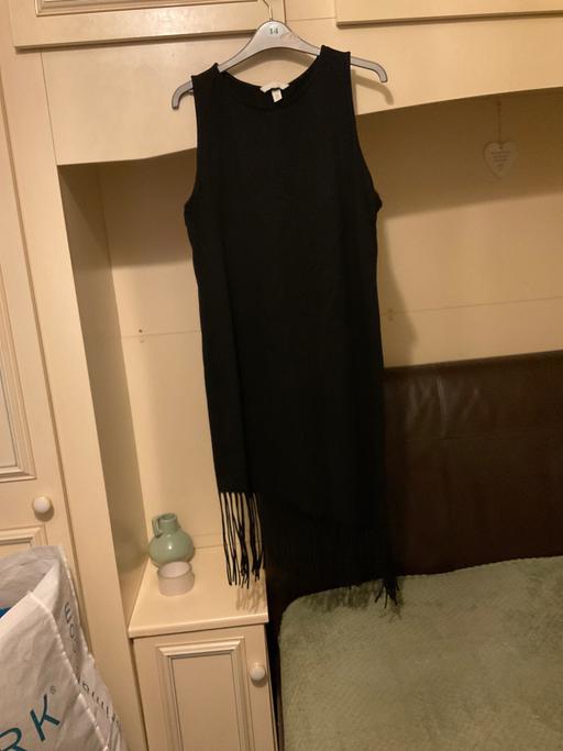  — Dress