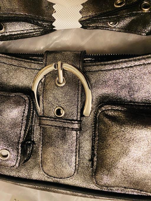  — Claire’s handbag