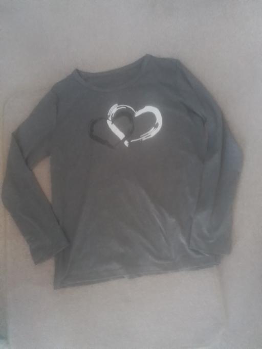  — BRAND NEW NO TAG LADIES TOP