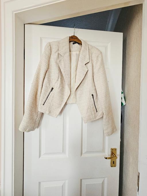  — Shimmer jacket, size 14.