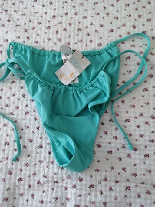  — ladies Bikini bottoms size *L*