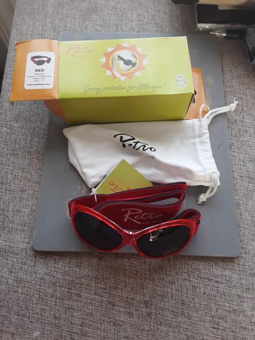  — kids sunglasses
