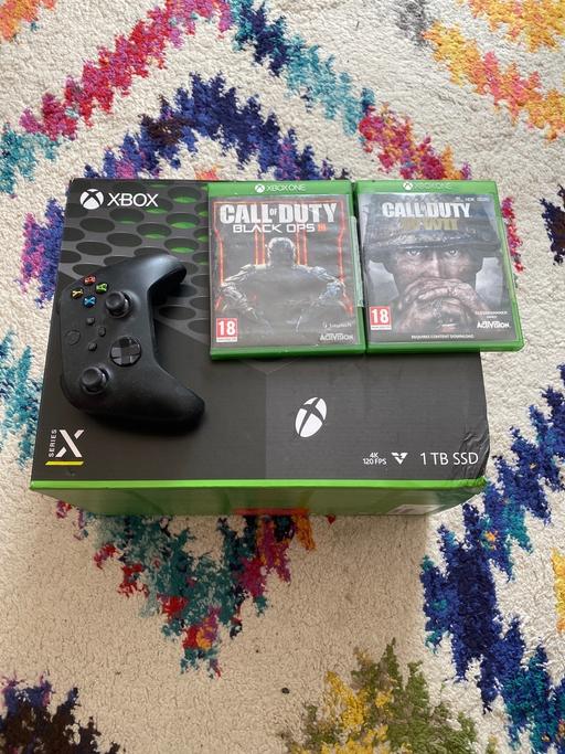 — Xbox series X 1TB  with box & chargeable cont