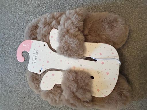  — Ladies Slippers