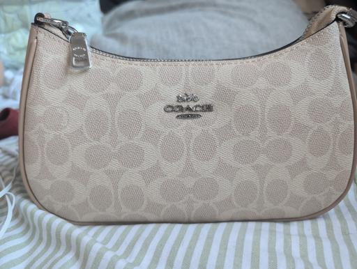  — coach shoulder bag - nude 