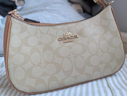  — coach shoulder bag