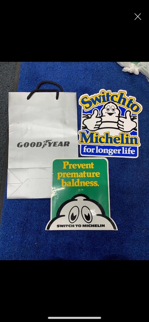  — Michelin stickers & Goodyear bag