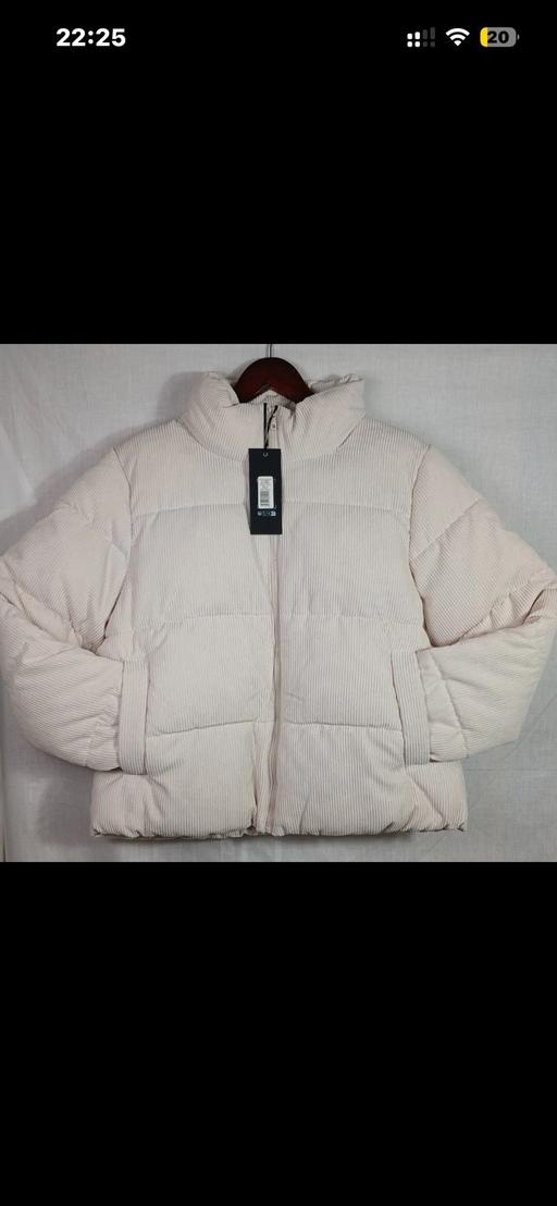  — Weekend Vibes cream puffer coat size 14