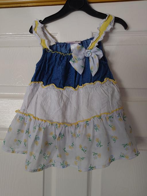  — Girls blue/white top size 4 years