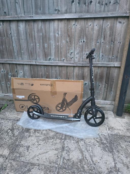 — Brand new LaScoota kick scooter