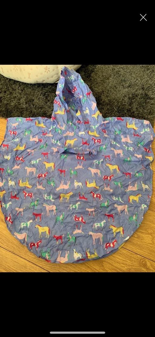  — Joules packable shower proof poncho