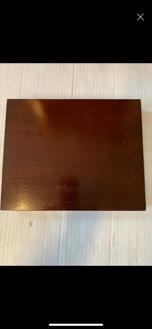  — Block of polished wood