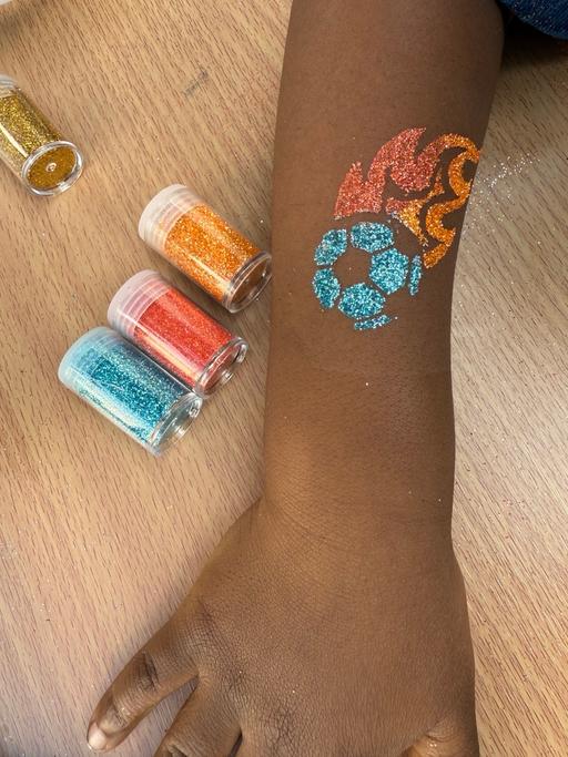  — Glitter tattoos