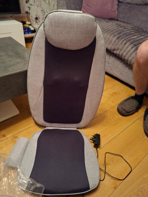  — massage chair never used