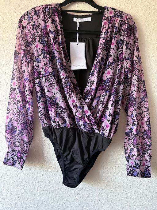  — Floral deep v neckline bodysuit