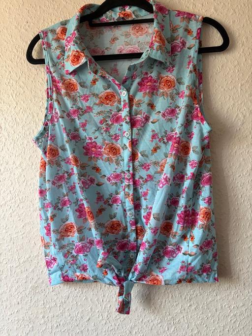  — Floral sleeveless top