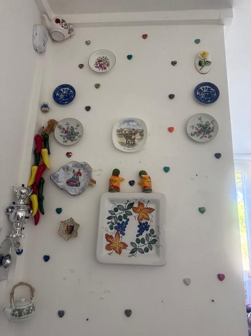  — Decorative Wall Plates and Figurines