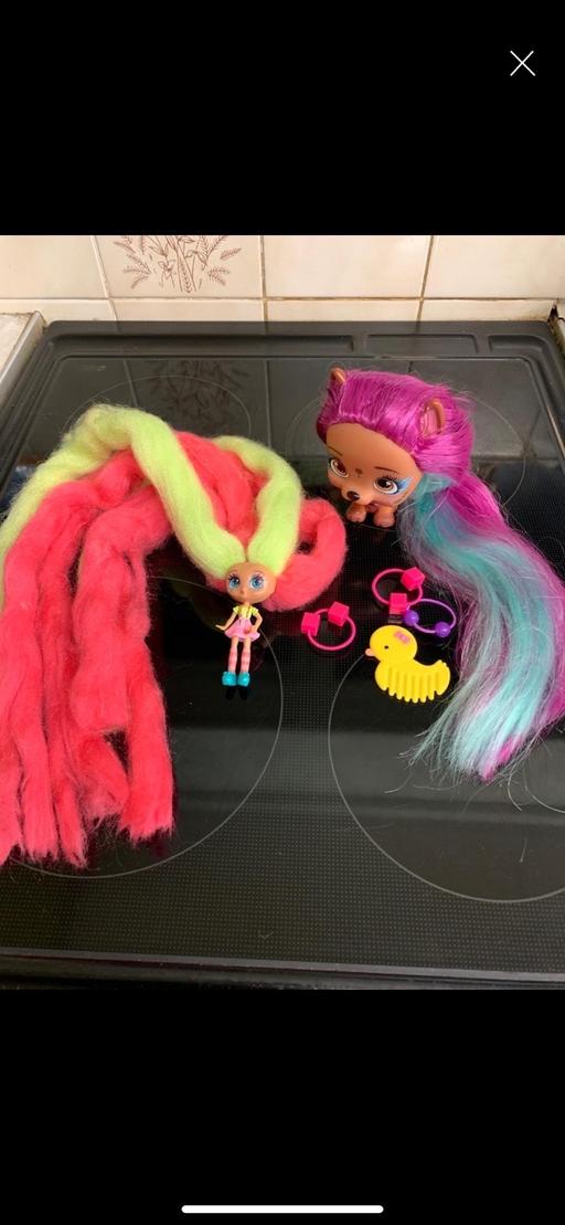 — Dolls