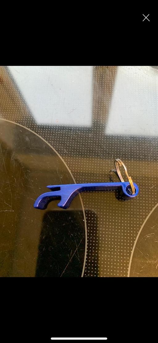  — Bottle opener keyring