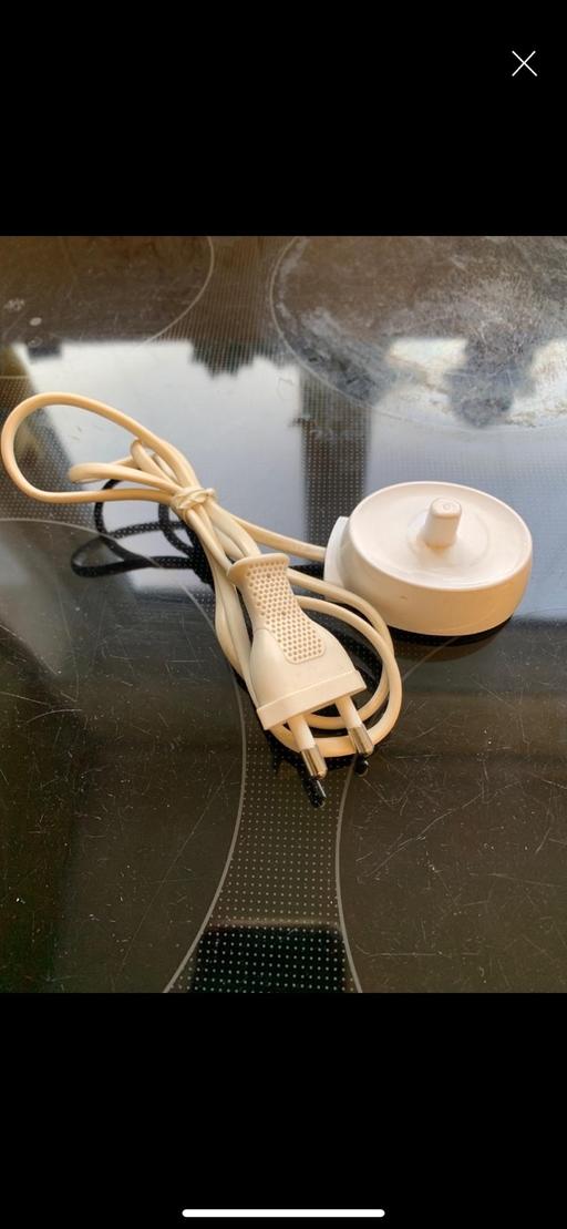  — Electric toothbrush charger