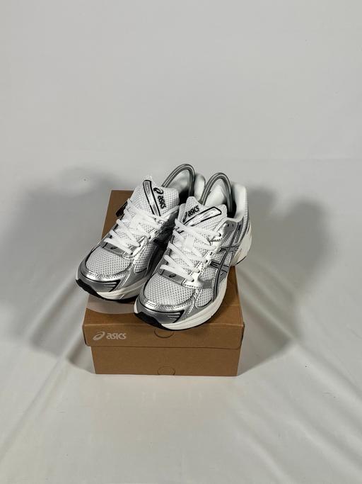  — ASICS