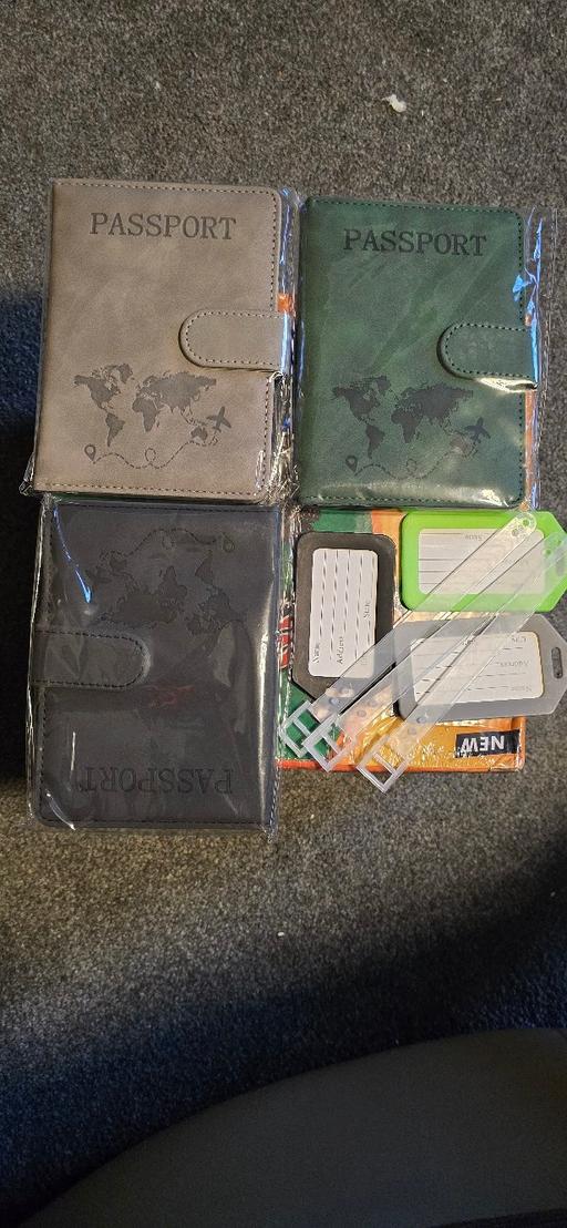  — 3 x passport wallets & luggage tags