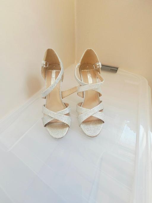  — Shoes, size 5.