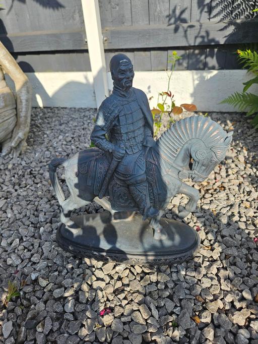  — garden statue