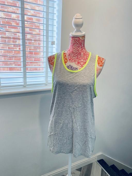  — (12/14) MATALAN TOP £1