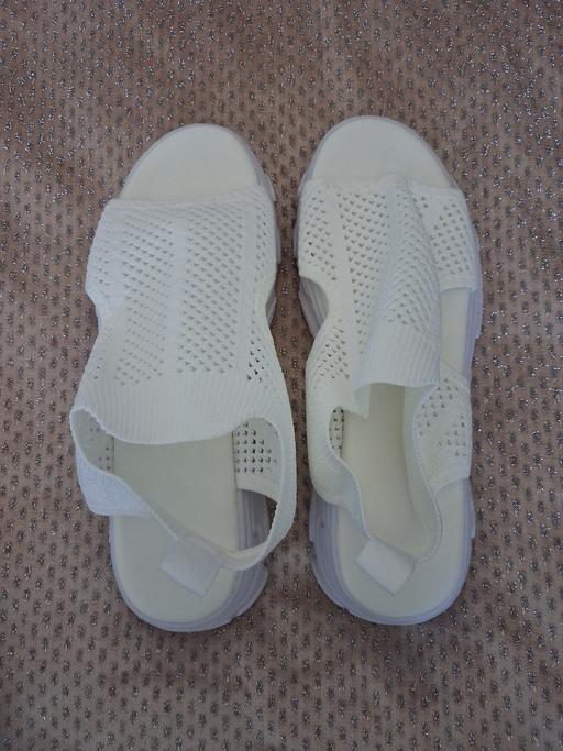  — SUMMER SANDLES