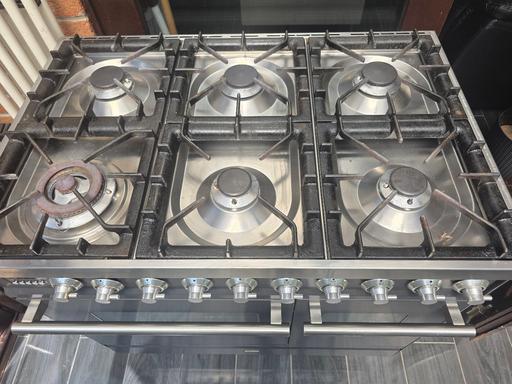  — cooker