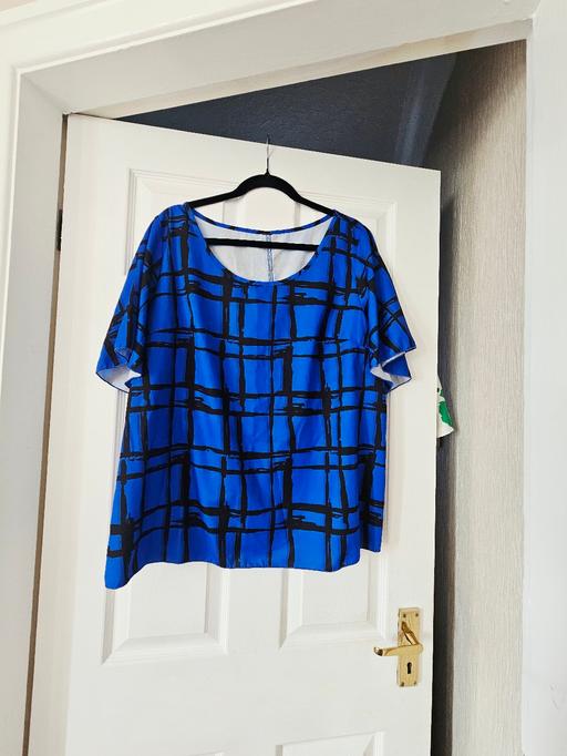  — Top, size 18/20..NEW without tags