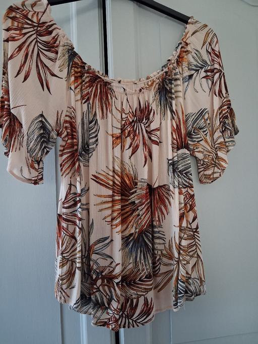  — GORGEOUS TOPS