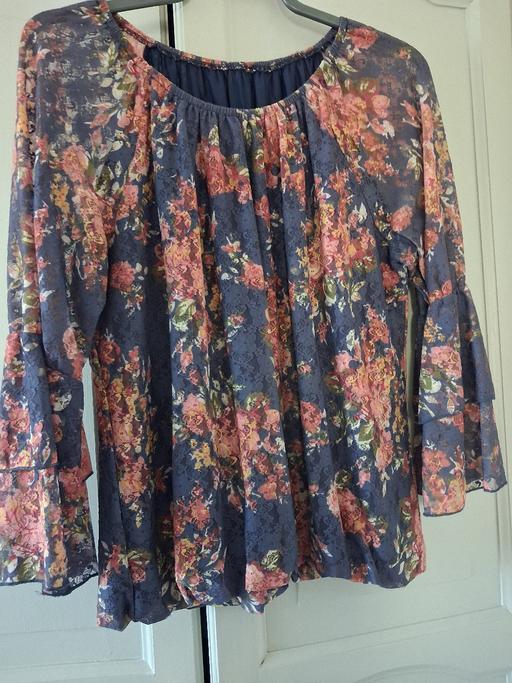  — LOVELY TOP