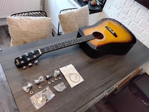  — acoustic guitar squier by fender sunburst